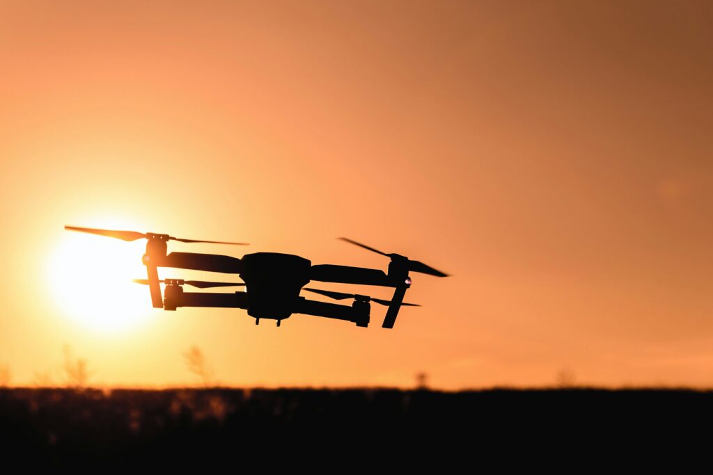 drone flying by the sunset